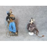 Two vintage lamps. One of a German porcelain doll on a sprung base in silk lace dress, playing the