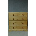 A pine chest of two short over three long drawers. H.92 W.92 D.47cm
