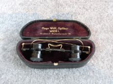 A pair of antique German watchmaker/jewellers adjustable magnifying glasses in original gilded