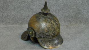 Thought to be a WW1 German Prussian lobster tail Pickelhaube helmet. Metal overlapping plates