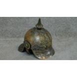 Thought to be a WW1 German Prussian lobster tail Pickelhaube helmet. Metal overlapping plates