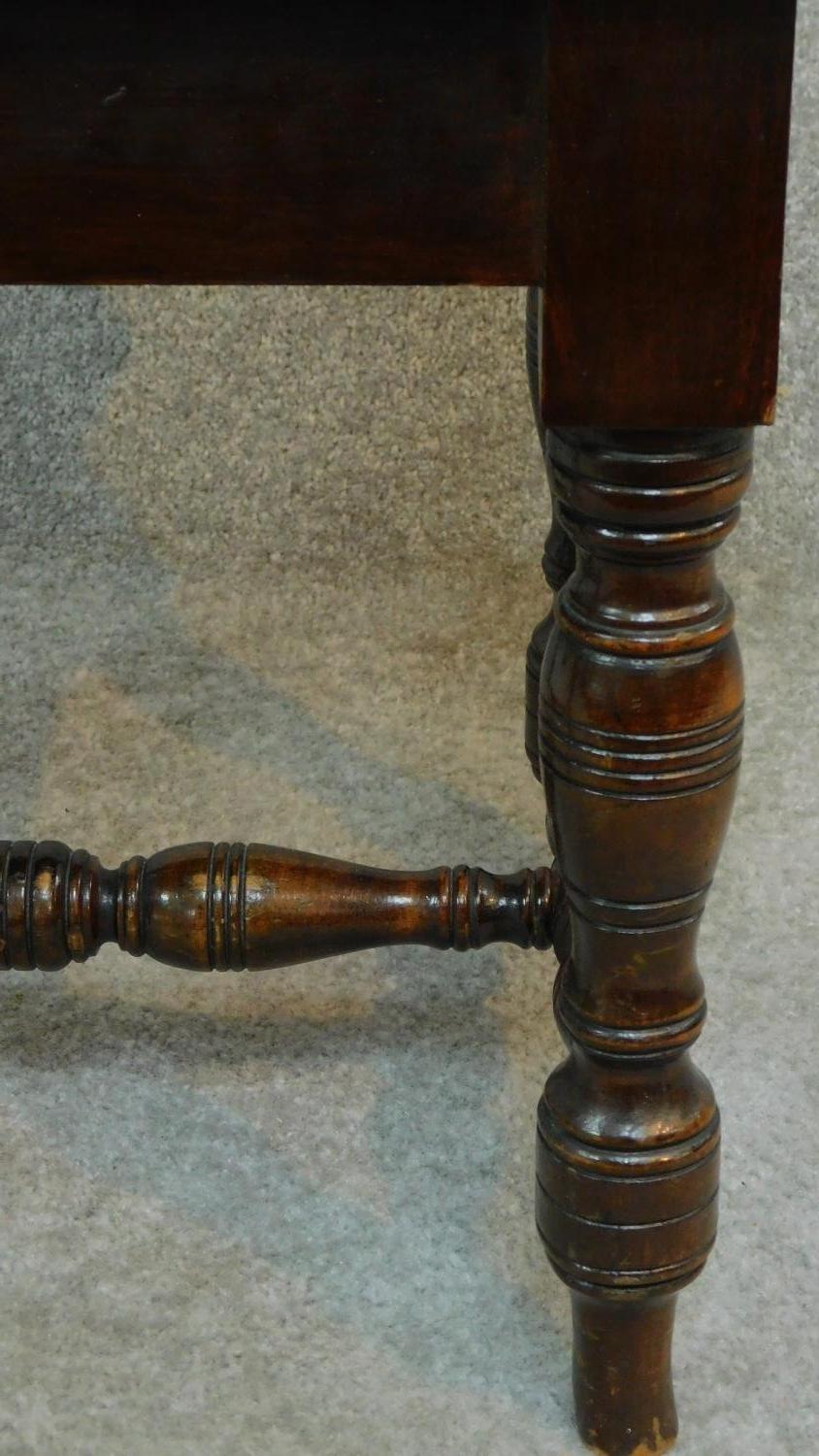 An Edwardian mahogany adjustable piano stool raised on stretchered turned tapering supports. H.46 - Image 5 of 6