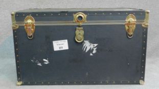 A large contemporary black brass bound steamer trunk. H.55 W.91 D.51cm