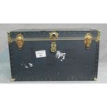 A large contemporary black brass bound steamer trunk. H.55 W.91 D.51cm