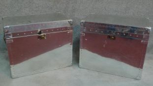 A pair of contemporary aviator style cabin trunks with blue linen interior. H.50 W.61 D.41cm