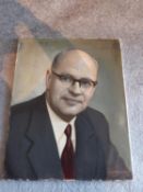 An oil on canvas portrait of a bald man in glasses, signed R.S Mendelssohn.