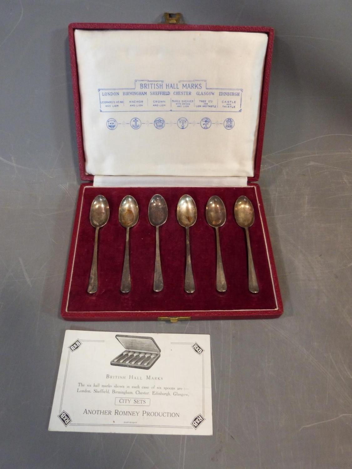 A cased set of British Hallmark silver spoons, each with a different town assay Mark, comes with