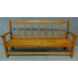 An American yellow wood bench. H.97 W.190 D.55cm