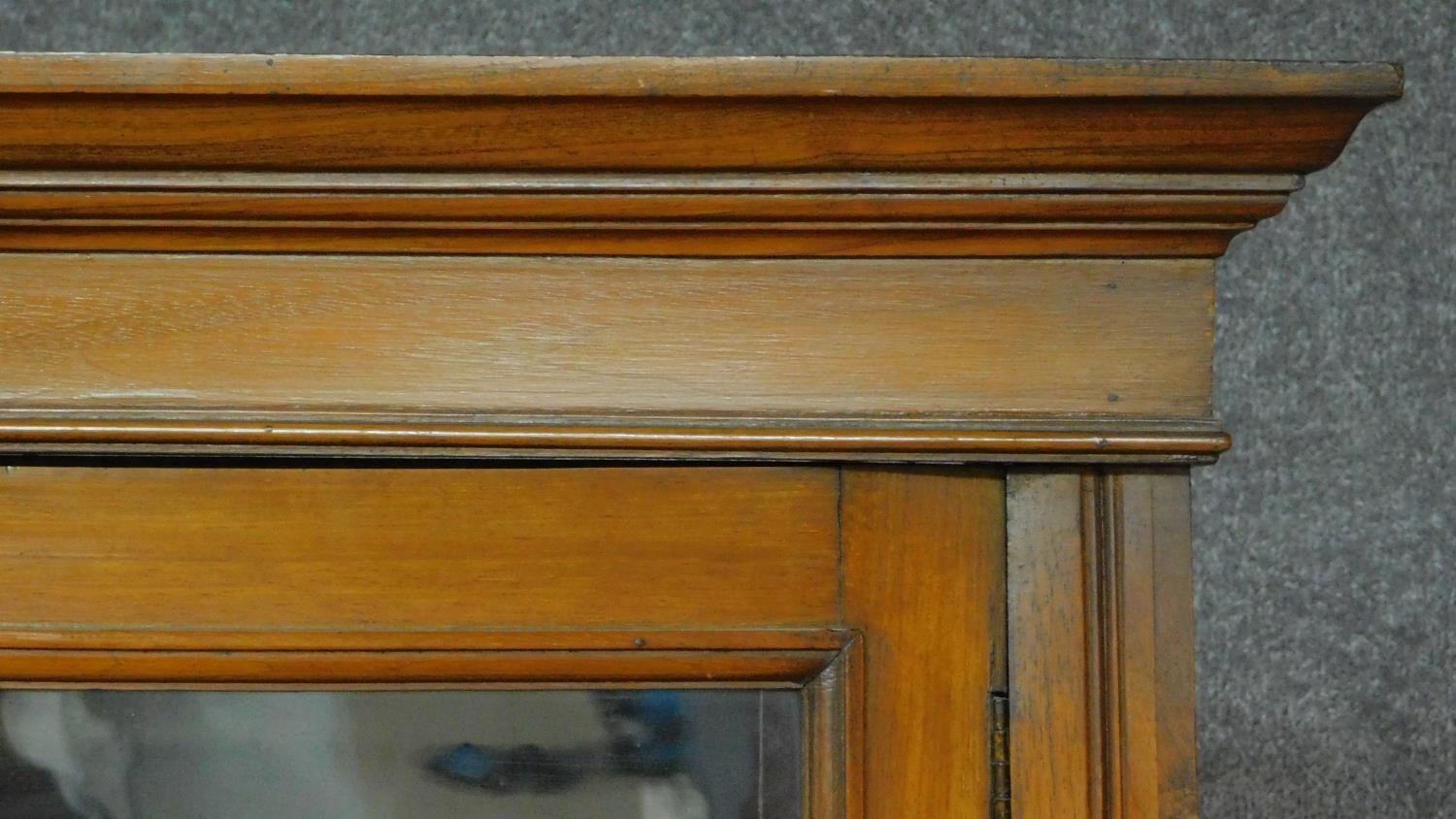 A Victorian oak library bookcase, the upper glazed section above panelled doors on plinth base. H. - Image 4 of 7