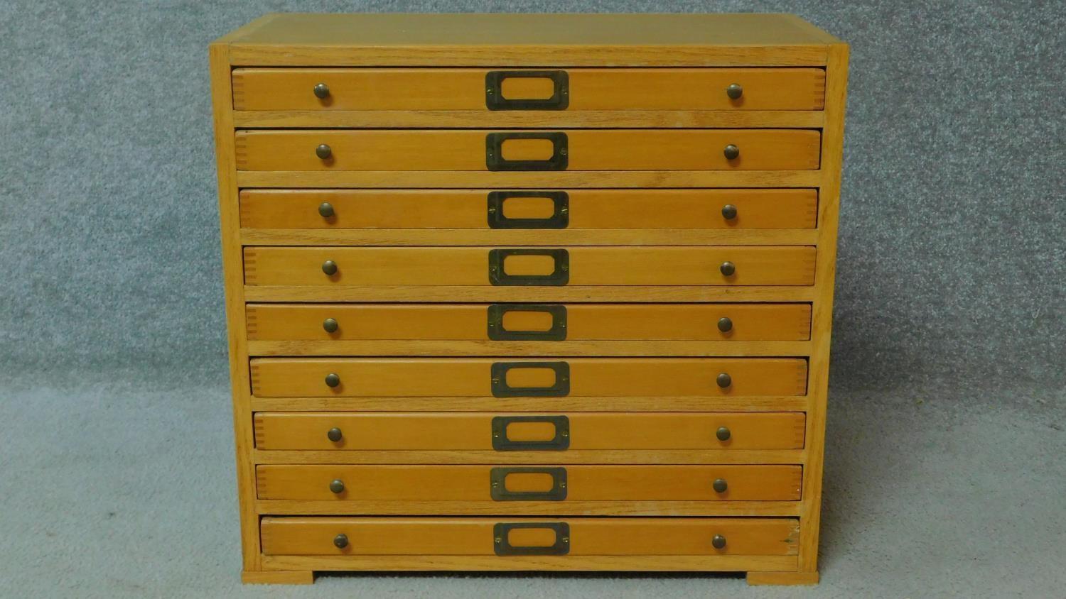 A mid 20th century oak specimen or filing cabinet H.48 W.51 D.26cm