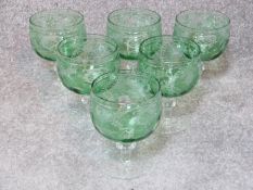 Six large antique Bohemian engraved goblets. Five with matching design and one with a different