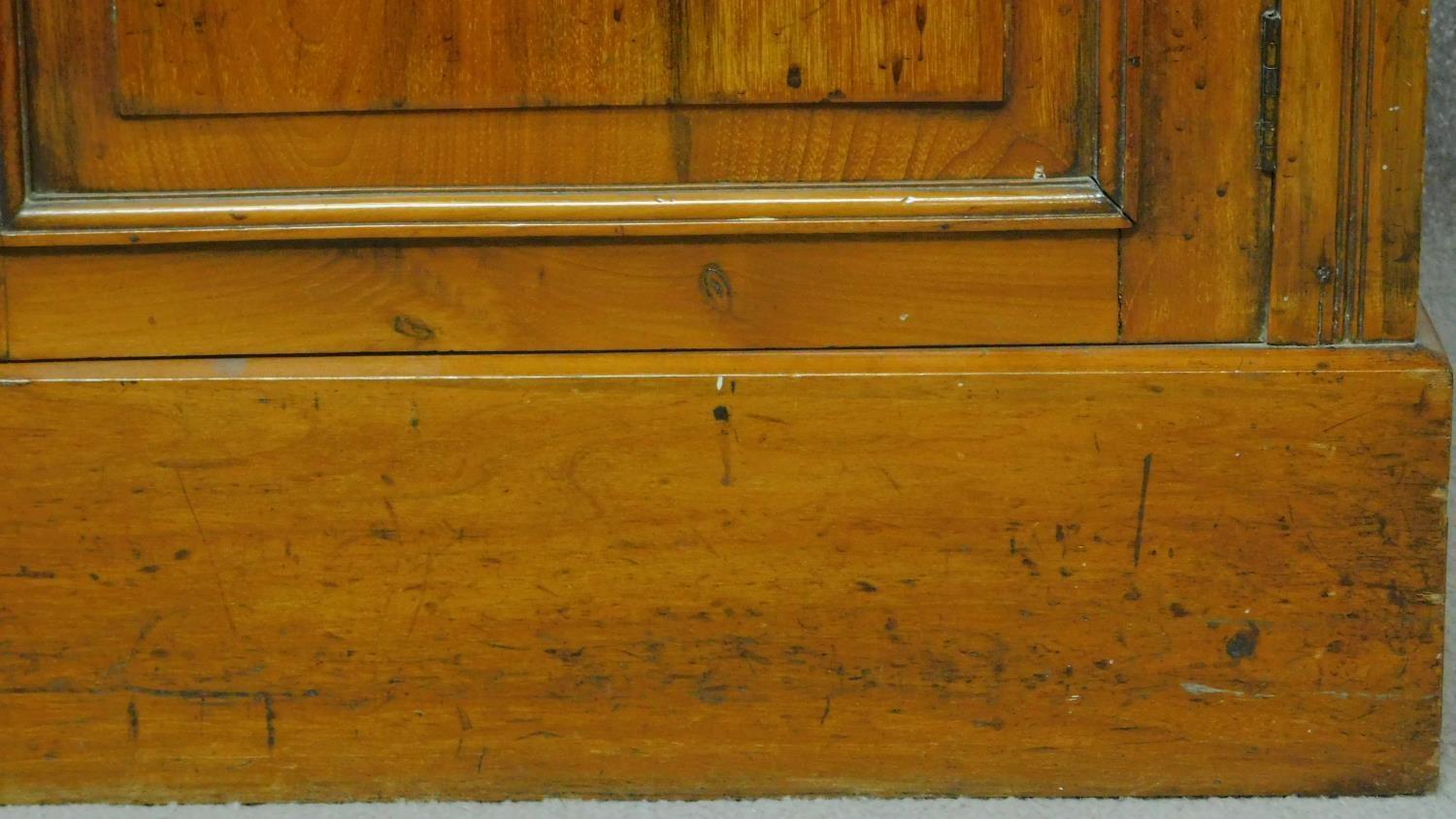 A Victorian oak library bookcase, the upper glazed section above panelled doors on plinth base. H. - Image 6 of 7