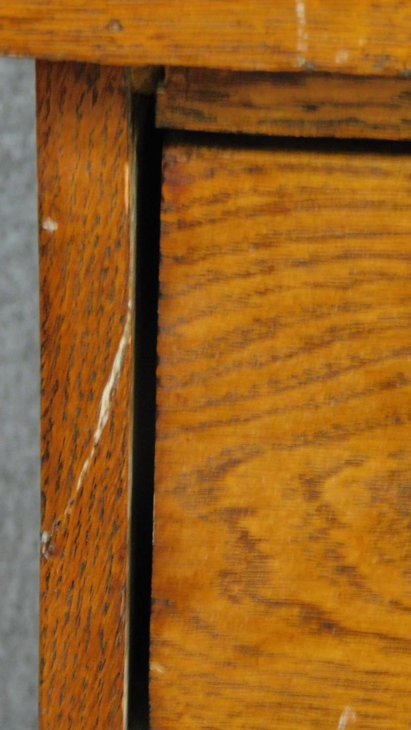 A late 19th century oak three drawer dressing chest with leaf carving and raised on bracket - Image 11 of 12