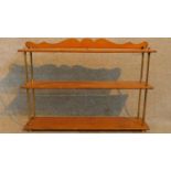 A set of Victorian oak open shelves with brass supports and feet. H.63 W.89 D.20cm