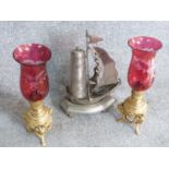 A pair of antique lamps and pierced metal galleon lantern. The oil lamps have engraved lustre