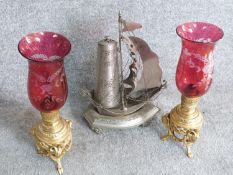 A pair of antique lamps and pierced metal galleon lantern. The oil lamps have engraved lustre