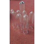 Eight wall mounted Conran Shop glass tube wall hanging planters/flower vases. Seven of the same size