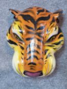 A vintage painted carved wood tigers head. 41 x 32