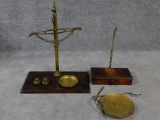 Two Victorian brass and mahogany sets of scales. One made by W & T Avery, Birmingham, inscribed '