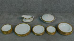 A Royal Worcestershire gilded design part dinner set. Stamped.