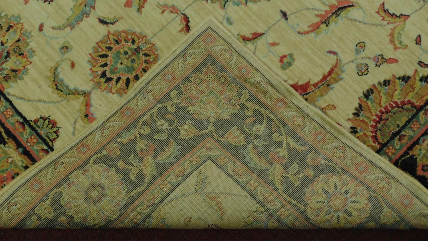 A Kashan style rug, all over spandrel motifs with repeating petal motifs on an ivory field, - Image 4 of 4