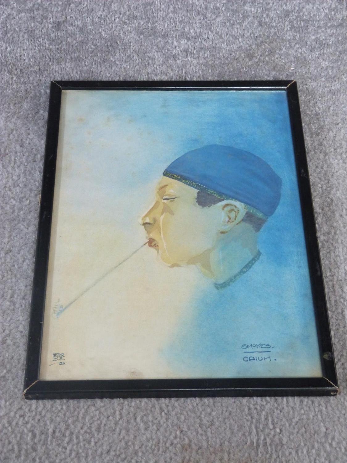 A framed watercolour of a man smoking an opium pipe, signed Peter Lyle. 35x25.5