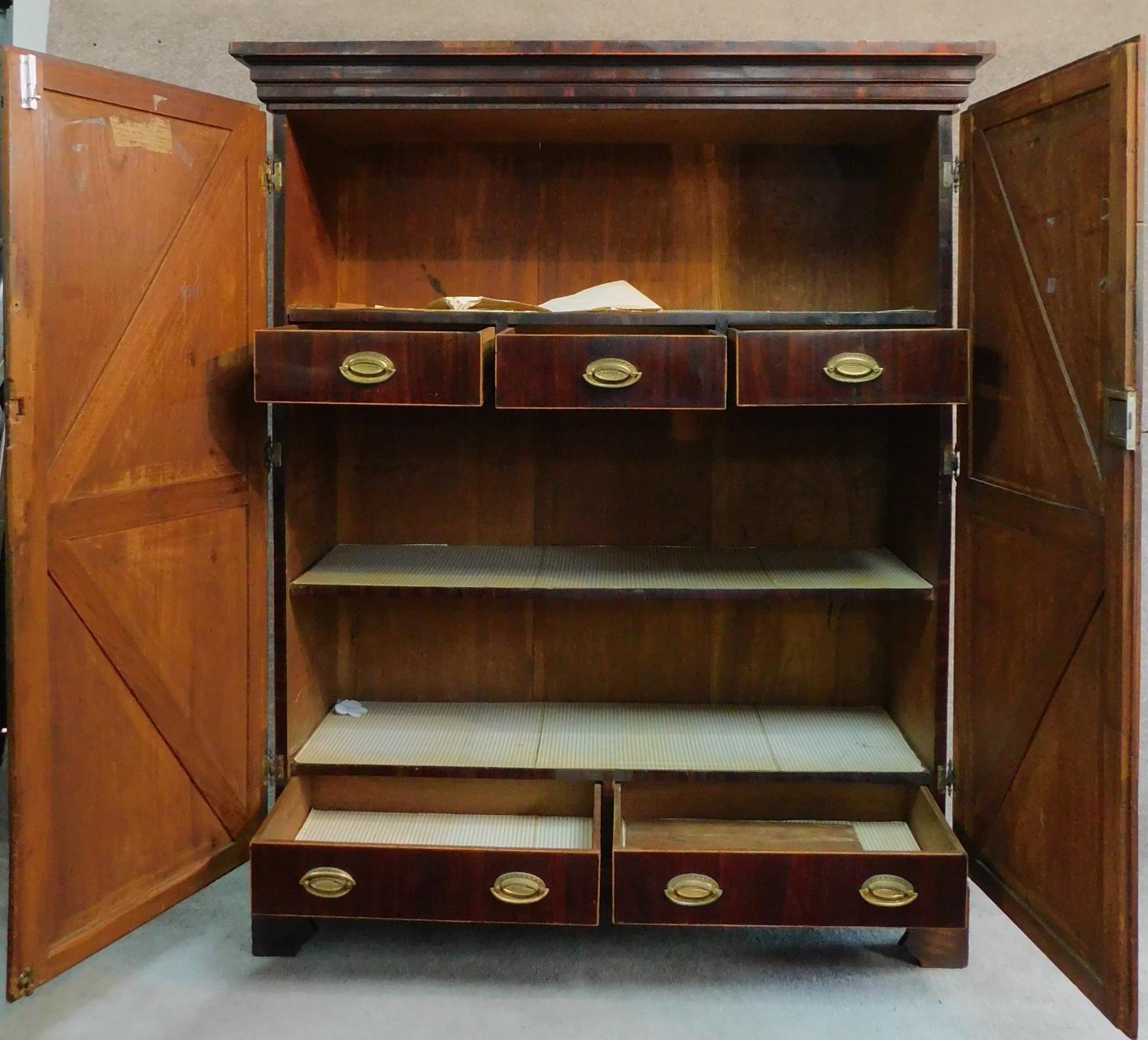 A Georgian mahogany press cupboard with quarter veneered and crossbanded panel doors enclosing - Image 2 of 10