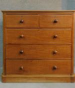 A Victorian mahogany chest of two short over three long drawers on plinth base. H.116 W.121 D.53cm