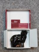 A new in box Czech brown glass lamb by Moser. Designed by Jaroslav Stursa. Signed to base and has