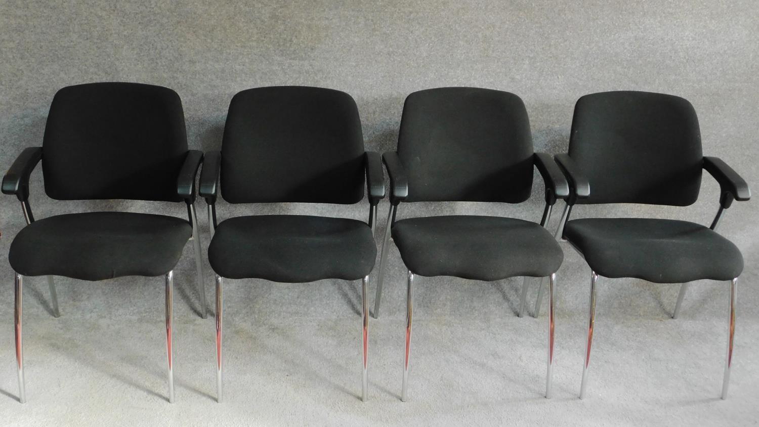 A set of four contemporary office armchairs. H.83cm