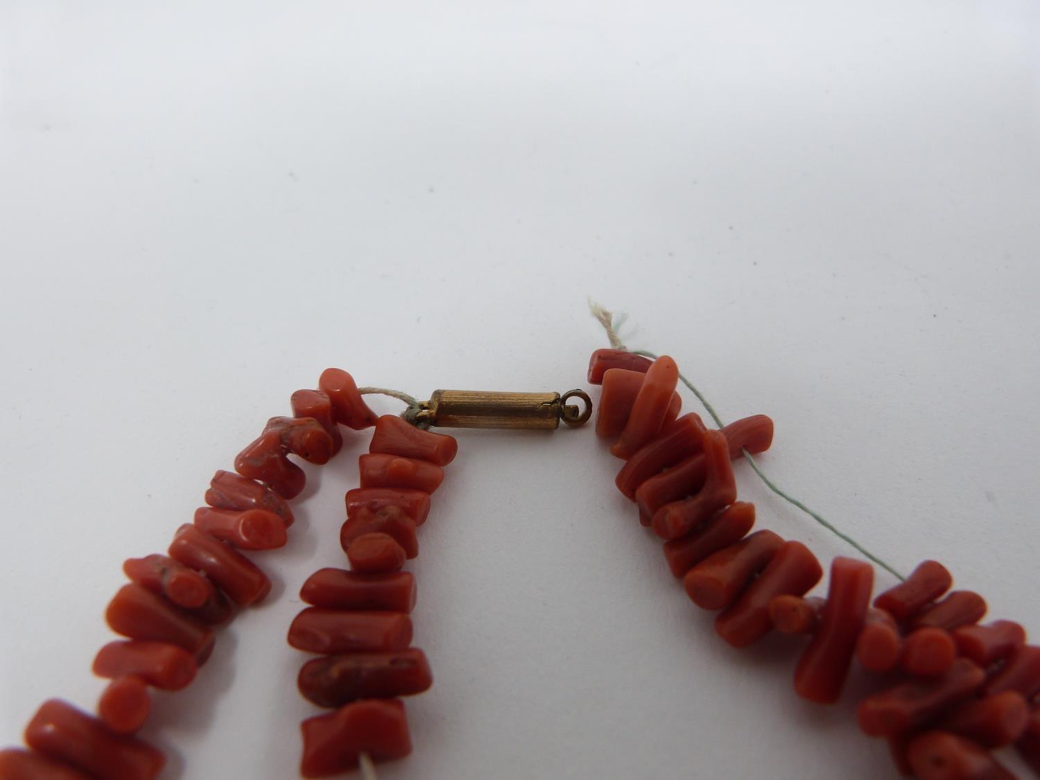 A collection of antique coral and gemstone necklaces. Including a Chinese goldstone necklace with - Image 3 of 20