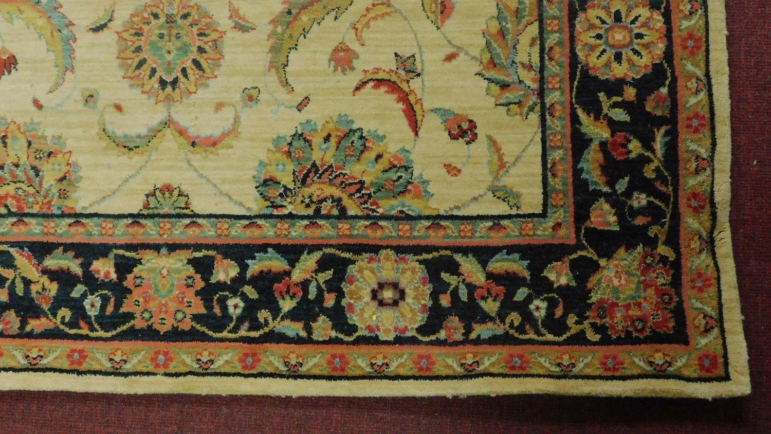 A Kashan style rug, all over spandrel motifs with repeating petal motifs on an ivory field, - Image 3 of 4
