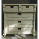 A 19th century Continental painted chest of two short over three long drawers flanked by turned