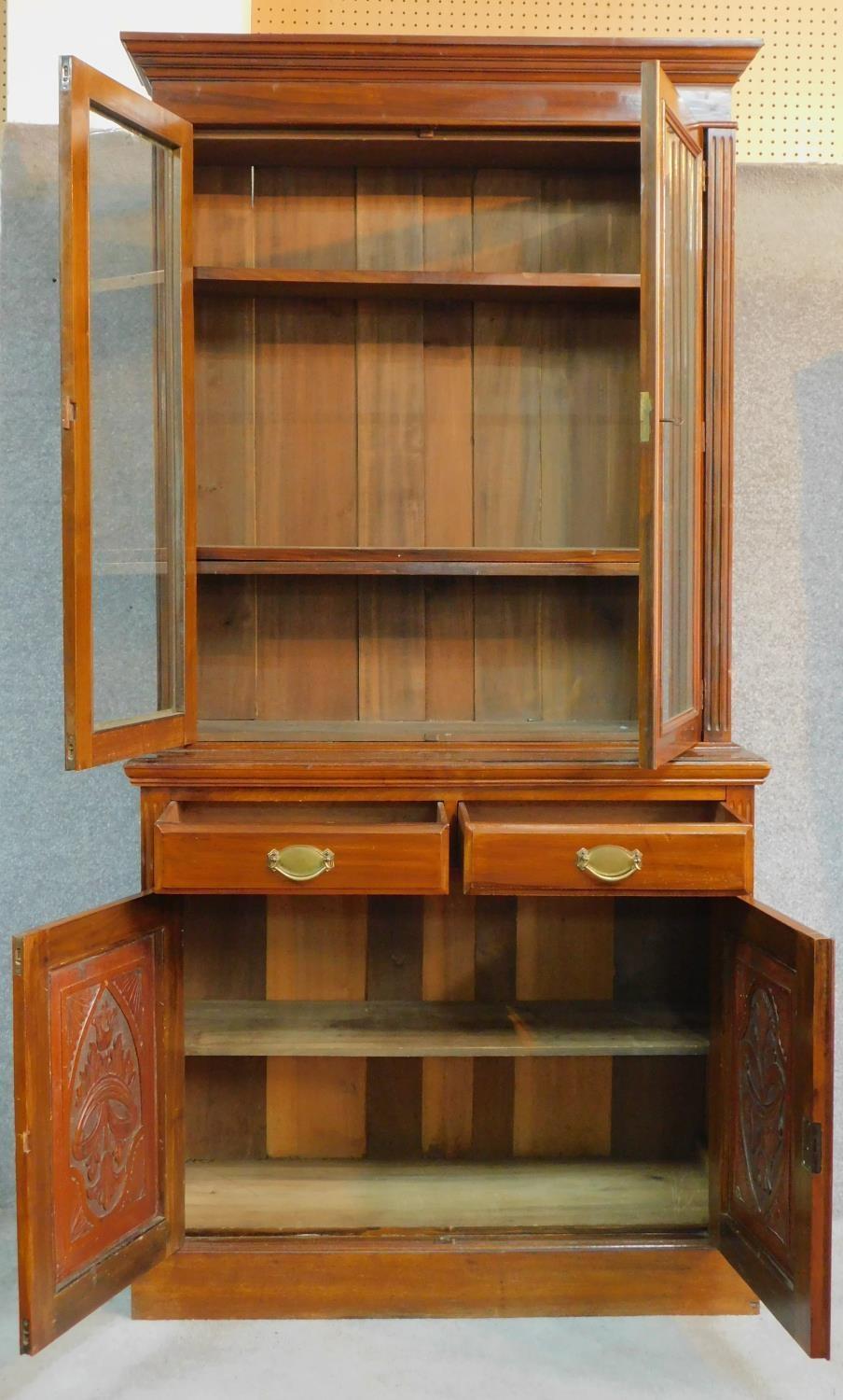 A late 19th century walnut library bookcase with glazed upper section above pair of frieze drawers - Image 2 of 4