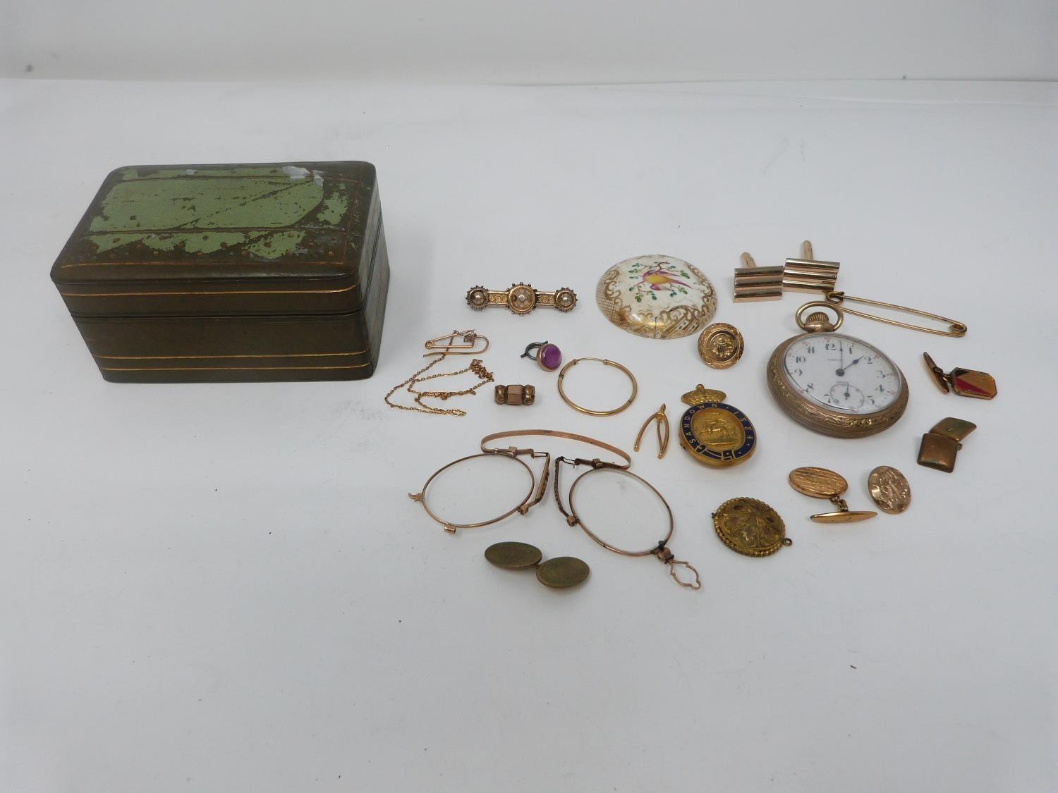A collection of rolled gold and yellow metal jewellery. Including brooches, a pocket watch, an