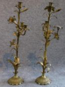 A pair of antique French gilded brass lily candelabras. H.53cm