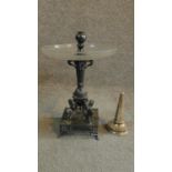 An antique metal and cut glass tazza centrepiece. The main stem is supported on the backs of four