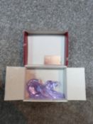 A new in box vintage Czech purple glass dog by Moser. Designed by Jaroslav Stursa. Signed to base