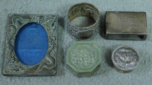 A silver match box holder stamped sterling silver, Wai Kee, Hong Kong with Chinese character on