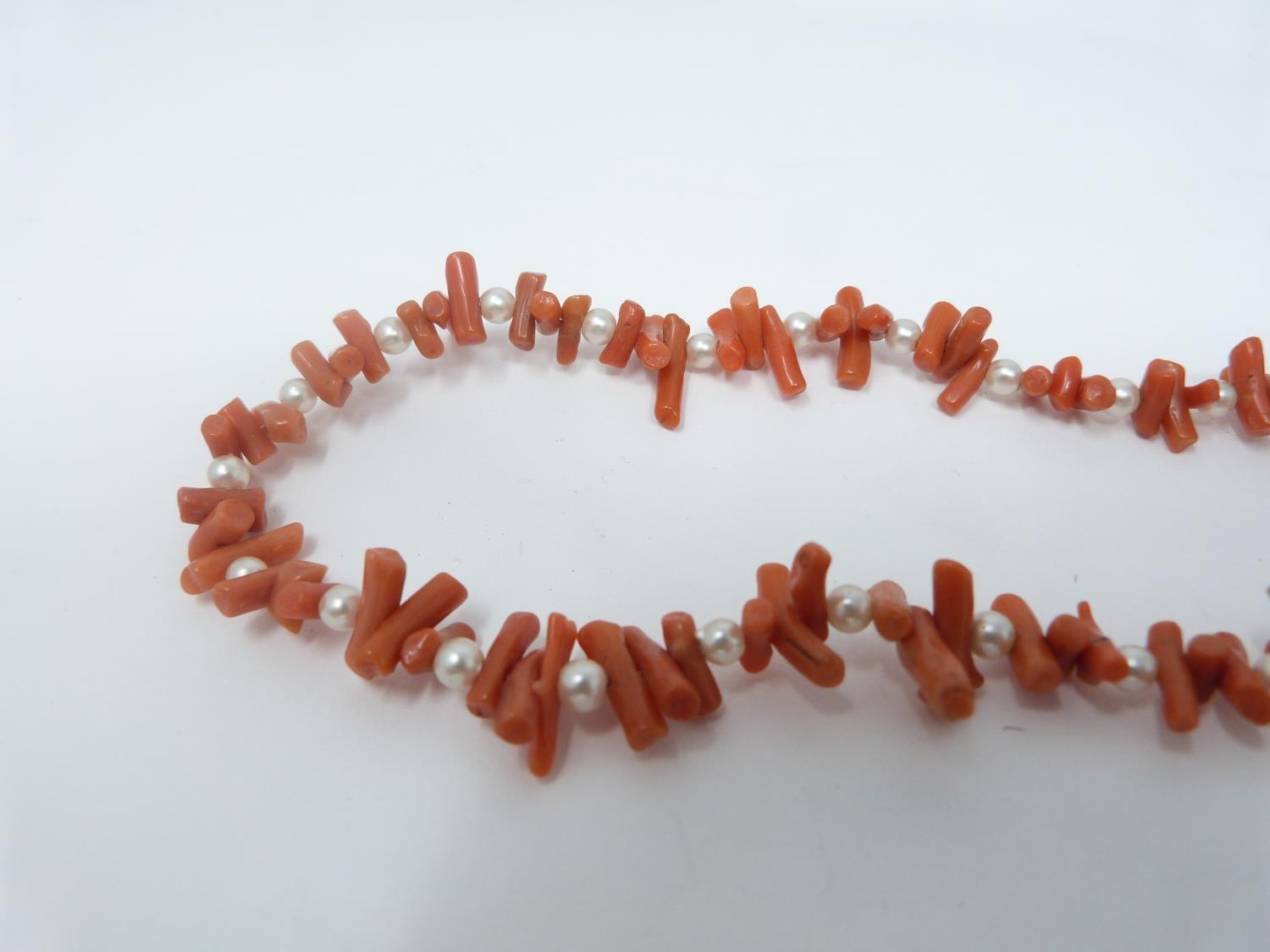 A collection of antique coral and gemstone necklaces. Including a Chinese goldstone necklace with - Image 13 of 20