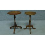 A Victorian style walnut and mahogany crossbanded lamp table raised on tripod base and another