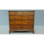 A Georgian mahogany chest of four drawers long drawers on bracket feet. H.76 W.85 D.45cm