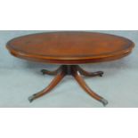 A Regency style mahogany low table raised on turned swept legs on casters. H.54 W.125 D.72cm