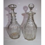 Two Georgian cut glass decanters. H.28cm