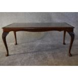 A mahogany Georgian style coffee table with a glass top. H.40 x 97cm