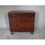 A Victorian mahogany mahogany chest of two short over three long drawers on turned supports. H.103 x