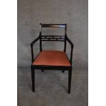 A 19th century mahogany open armchair. H.84 x 50cm