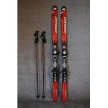A pair of Atomic Pro lightweight skis, ski sticks and carrying holdall. H.145cm