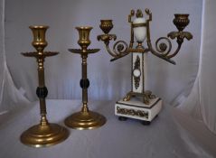 A pair of 19th century brass candlesticks and an ormolu mounted twin branch candelabra. H.26cm
