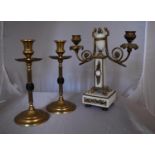 A pair of 19th century brass candlesticks and an ormolu mounted twin branch candelabra. H.26cm